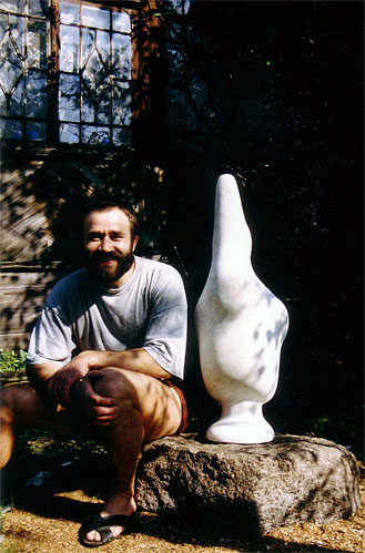 Dumitru Verdianu in his atelier’s garden with one of his "Boboc" / Saint Petersburg, Russia, 2000
